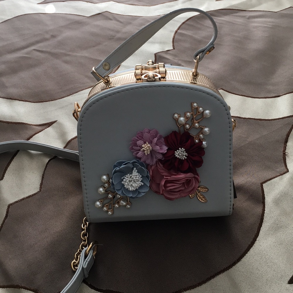 Aqua blue cross body with flower embellishments